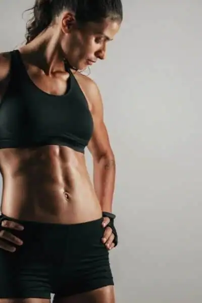 Toning Up at Home: The Ultimate Guide to Bodyweight Exercises 2 Image of woman's toned stomach after bodyweight exercises Ascot and non-surgical treatment from Lipo 360