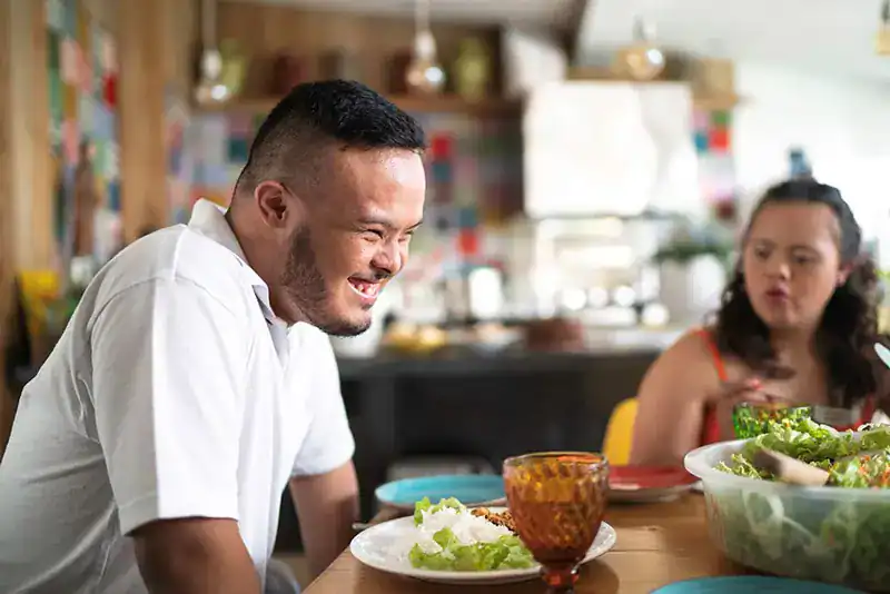 Empowering Weight Loss: A Comprehensive Guide for Individuals with Disabilities 2 Image of a disabled man and balance around nutrition to aid weight loss Ascot